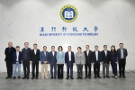 deputy director huang liuquan of the liaison office of the central people's government in the macao special administrative region, along with his delegation, visited the faculty of law at m.u.s.t.